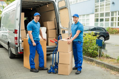 Packing boxes and preparing belongings for a flat move in Downe
